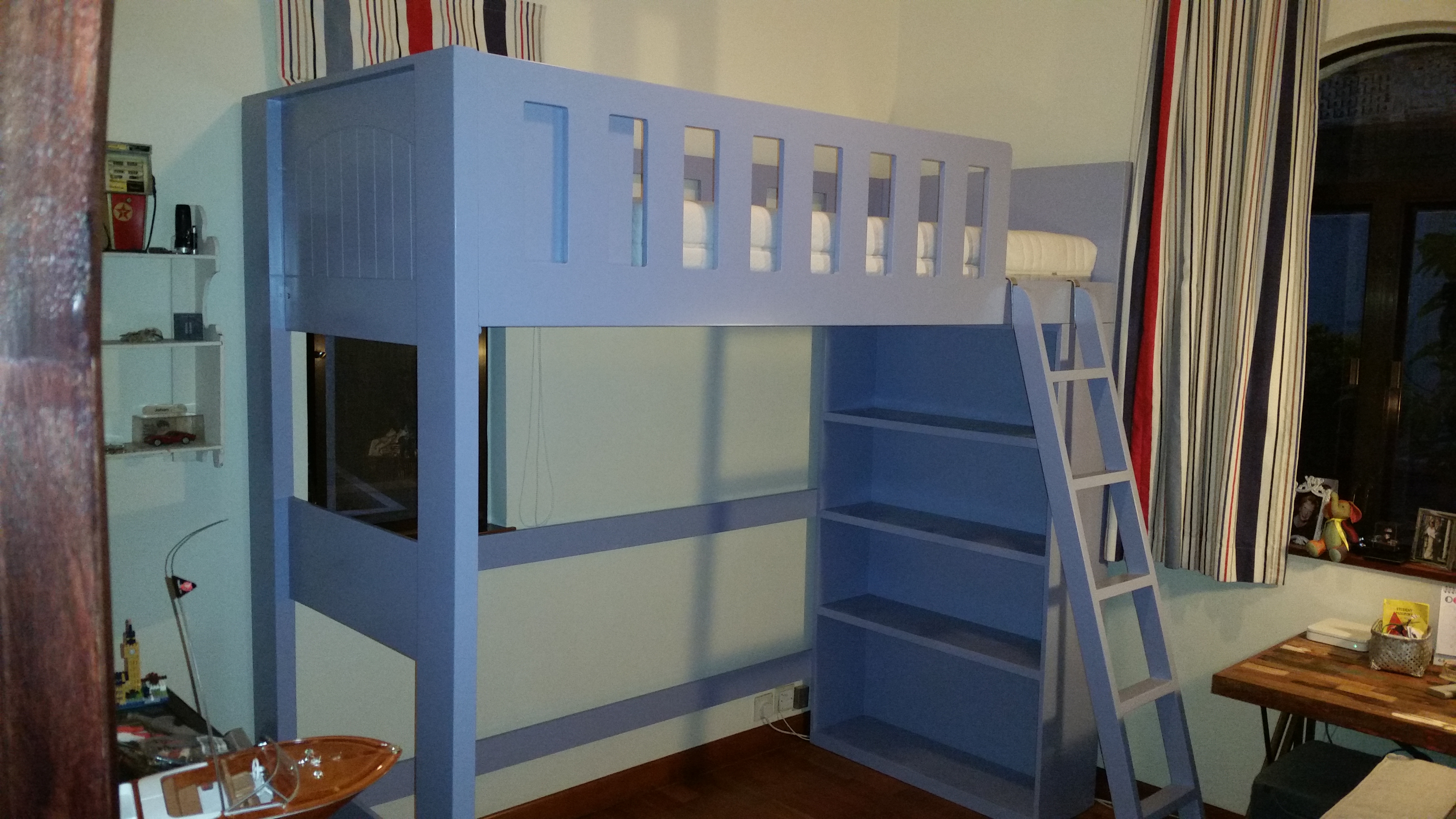 Custom-built boy's storage bed and bunk